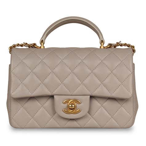 chanel minis set|Chanel mini flap bag with top handle.